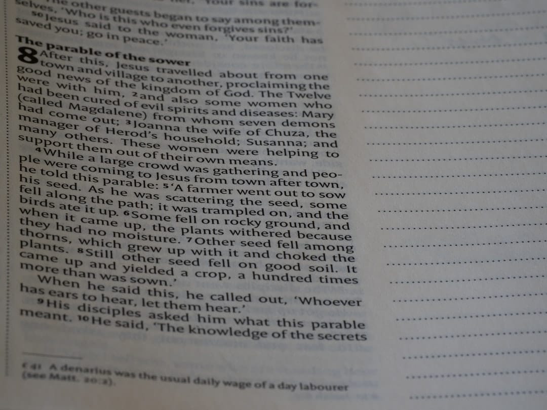 A close up of an open book with writing on it